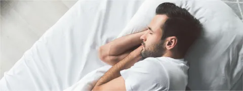 Hombre durmiendo. Dia mundial del sueño, Clínica Santa María